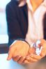 Caucasian businesswoman cupping hands.jpg