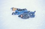 Children rolling in snow 0001.jpg