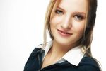 Close up of a young blond woman face with a white background uid 1453097.jpg