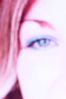 Close up of woman eye wearing blue eye shadow.jpg