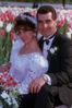Couple in front of flowers.jpg