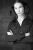 Frowning woman with her arms crossed.jpg
