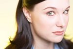 Frowning woman with nose piercing.jpg