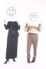 Man and woman holding up happy and sad face signs.jpg