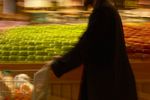 Man grocery shopping in a blur.jpg