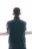 Man looking out a window.jpg