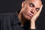 Man resting face in hand uid 1426264.jpg