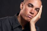 Man resting face in hand uid 1426265.jpg