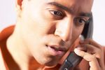 Man talking on telephone.jpg