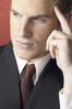 Man thinking with index finger at forehead.jpg