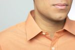 Man wearing orange shirt.jpg