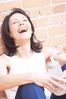 Mature adult woman laughing with water bottle uid 1427271.jpg