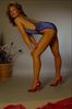 Model with blue swimsuit and red pumps.jpg