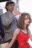 Model with curly hair and hairdresser.jpg