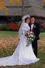 Newlyweds posing in fall.jpg