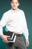 Passive male adult holding books.jpg