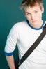 Sad male adult with shoulder bag uid 1452871.jpg
