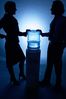Silhouette of people talking at water cooler 4.jpg
