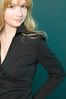 Smiling blonde with hands on hip.jpg