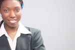 Smiling businesswoman in black suit 5.jpg