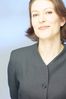 Smiling businesswoman looking upwards 1.jpg