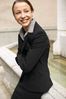 Smiling businesswoman uid 1433148.jpg