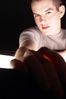 Teenaged boy reaching with hand.jpg