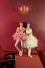 Two ballerinas in empty theater.jpg