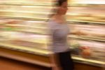 Woman grocery shopping in a blur an 1.jpg