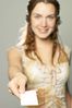 Woman in headset holding out card a81.jpg