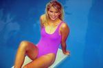 Woman in pink swimsuit on diving board.jpg