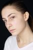 Woman in white t shirt uid 1426815.jpg