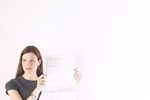 Woman reading newspaper 1.jpg