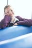 Woman sitting in blue vinyl seat.jpg