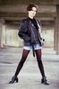Woman standing in leather jacket.jpg