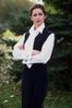 Woman standing with arms crossed.jpg