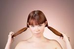Woman with bare shoulders and pigtails uid 1284716.jpg