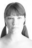 Woman with bare shoulders and pigtails.jpg