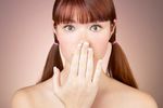 Woman with bare shoulders looking surprised uid 1284722.jpg