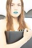 Woman with blue lips and briefcase.jpg