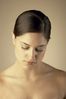 Young woman with downcast eyes uid 1284286.jpg