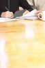 woman writing a check BE 3.jpg